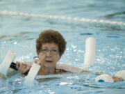 Teckla Shaylor, 77, of Vancouver does a workout in the swimming pool Tuesday at Marshall Community Center. Shaylor gets in the pool five days a week to help manage her chronic pain.