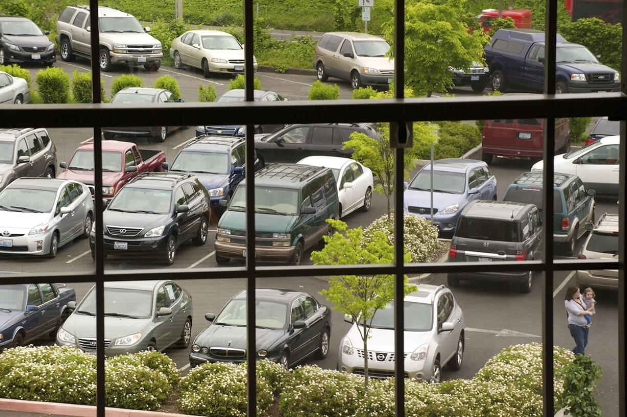 A full parking lot is a common sight at the Vancouver Community Library as parents bring their children to a popular storytime program Wednesday.