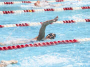 Arlene Delmage practices with her swim team, the Oregon Reign Masters, at Mt. Hood Community College in Gresham, Ore.