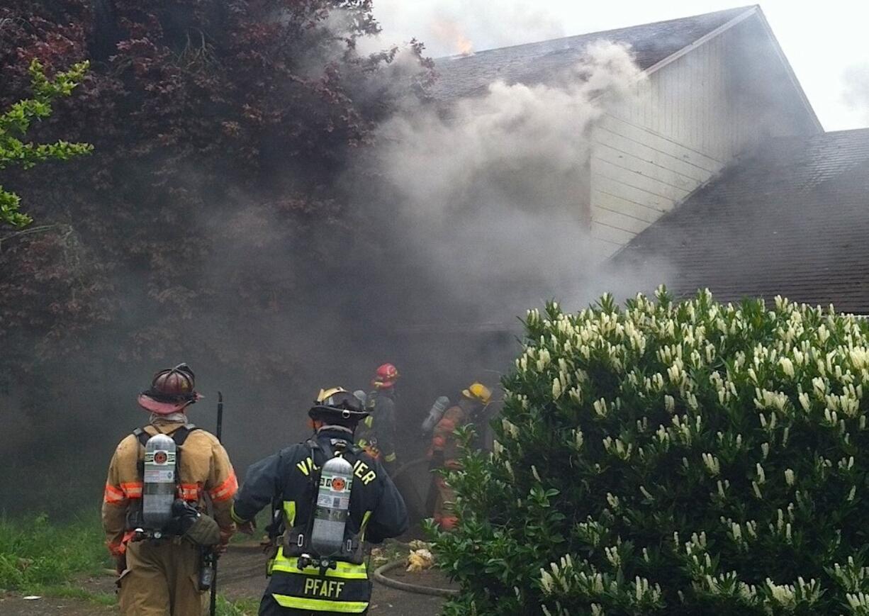 Fire burns a duplex on Northeast 85th Avenue in Vancouver's Ogden neighborhood.