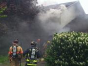 Fire burns a duplex on Northeast 85th Avenue in Vancouver's Ogden neighborhood.