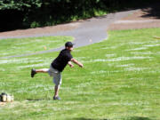 West Minnehaha: Disc golfer Eddie Florance lets fly at Leverich Park disc golf tournament on July 7 and 8.