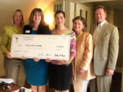 Shumway: YWCA Clark County board president Kelly Walsh, left, and executive director Sherri Bennett accept a big check from Heather Martin, D.J.