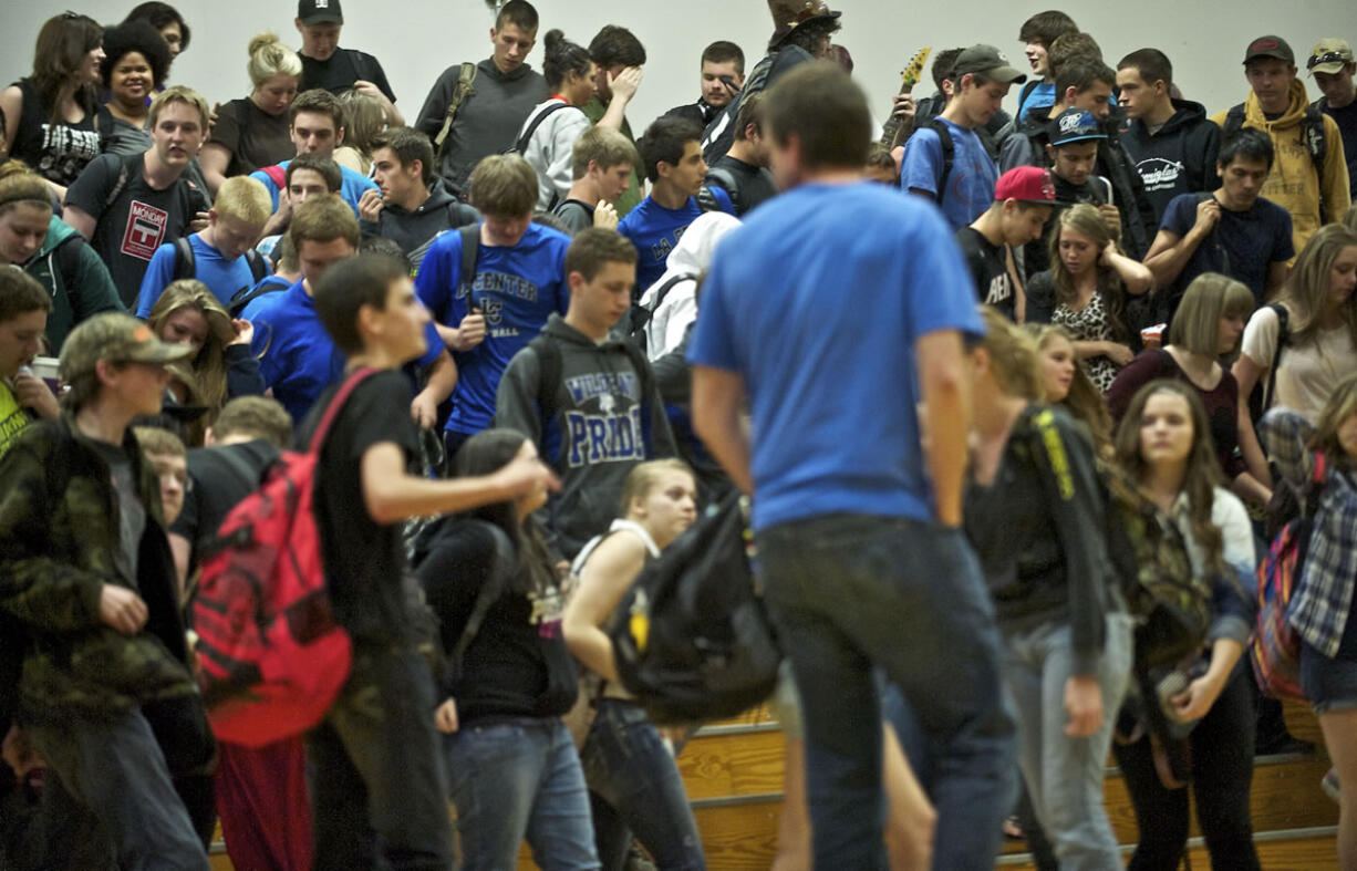 Students at La Center High School exit the gym after viewing a documentary called &quot;Chosen,&quot; about sex trafficking, which was produced by Shared Hope International.