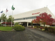 Camas-based Sharp Microelectronics of the Americas, shown here, is increasing its sales and remains highly profitable even as its corporate parent, Japan-based Sharp Corp. struggles with huge losses. Sharp Corp. said in an earnings report released Thursday that there is &quot;material doubt&quot; about its ability to survive after forecasting a record $5.6 billion full-year loss on falling demand for its display panels. Sharp employs about 270 people in two business units in Camas.