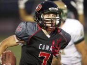 Camas running back Nate Beasley scores one of his five touchdowns in the Papermakers' 47-14 thrashing of Portland Jesuit at Doc Harris Stadium.