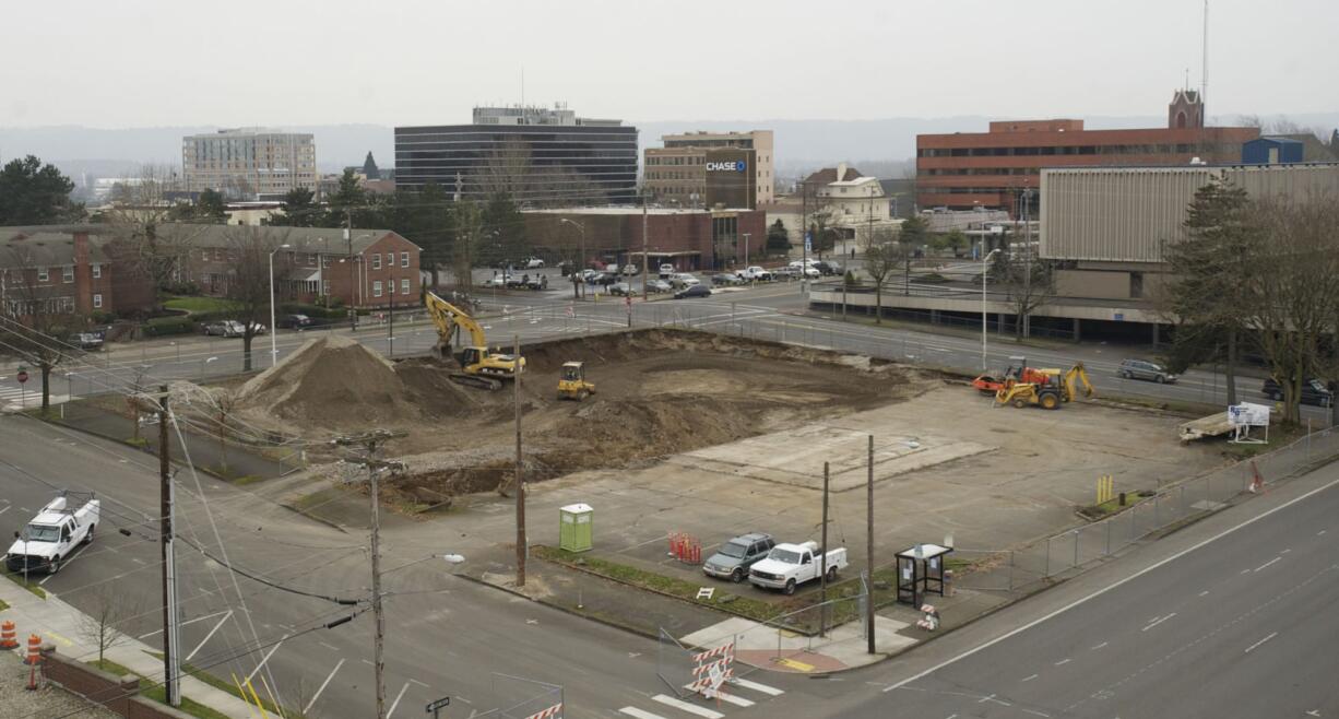 Construction has begun on the $16 million Prestige Plaza apartment complex on the former site of a walk-up Burgerville restaurant at Mill Plain and D Street.