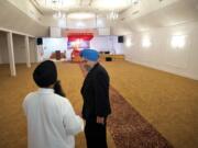 Jagjit Prehar Singh, right, talks to Sukwinder Singh inside Gurudwara Sahib Vancouver.