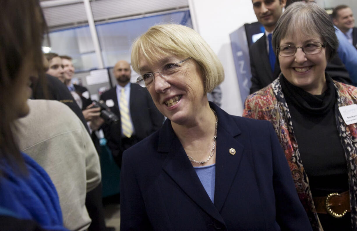 U.S. Sen. Patty Murray meets Reem Sabha, left, and teacher Barbara Elliott, both from Mountain View High School, at a reception at nLight Corp.