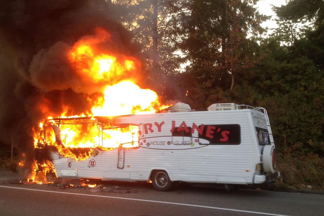 A 1986 Winnebago owned by Vancouver-based Mary Jane's House of Glass caught fire Sunday on Interstate 5 in Olympia.