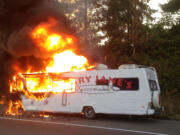 A 1986 Winnebago owned by Vancouver-based Mary Jane's House of Glass caught fire Sunday on Interstate 5 in Olympia.