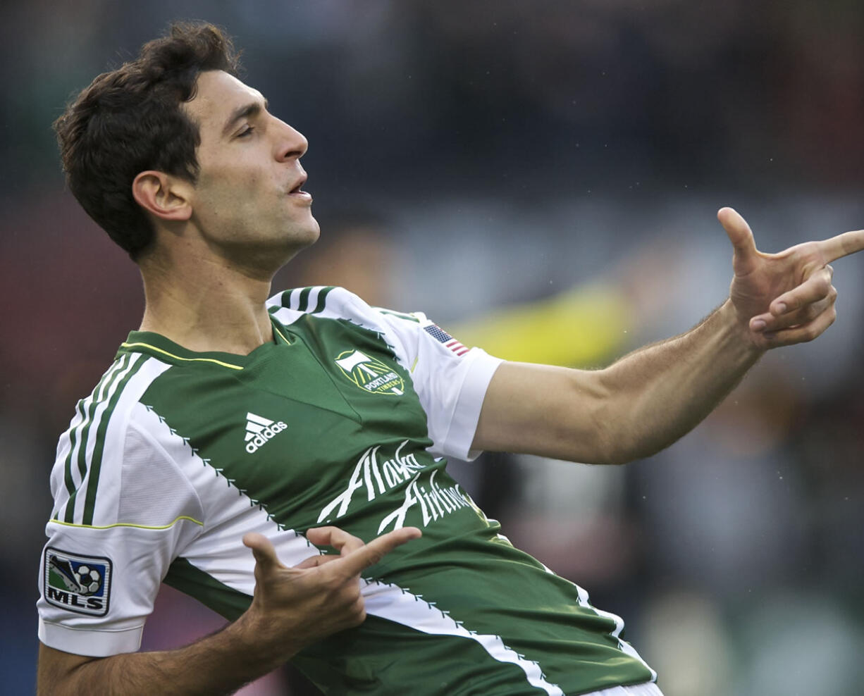 The Portland Timbers' Diego Valeri celebrates after scoring to tie the game 1-1 against the New York Red Bulls in the first half of their season opener at Jeld-Wen Field on Sunday.