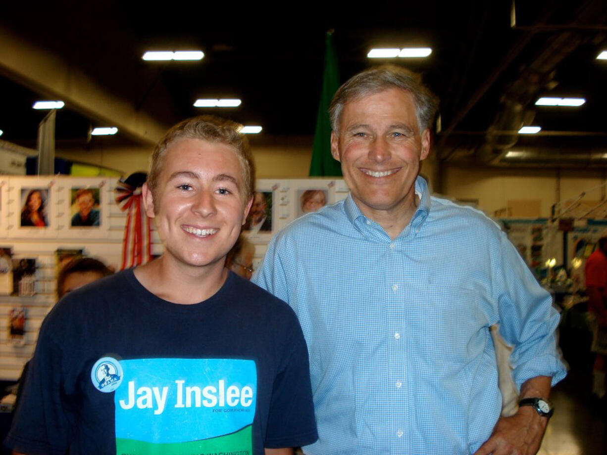 Dylan Koester, a 16-year-old student at Columbia River High School, poses alongside Democratic gubernatorial candidate Jay Inslee earlier this year as Koester helped out on the campaign trail.