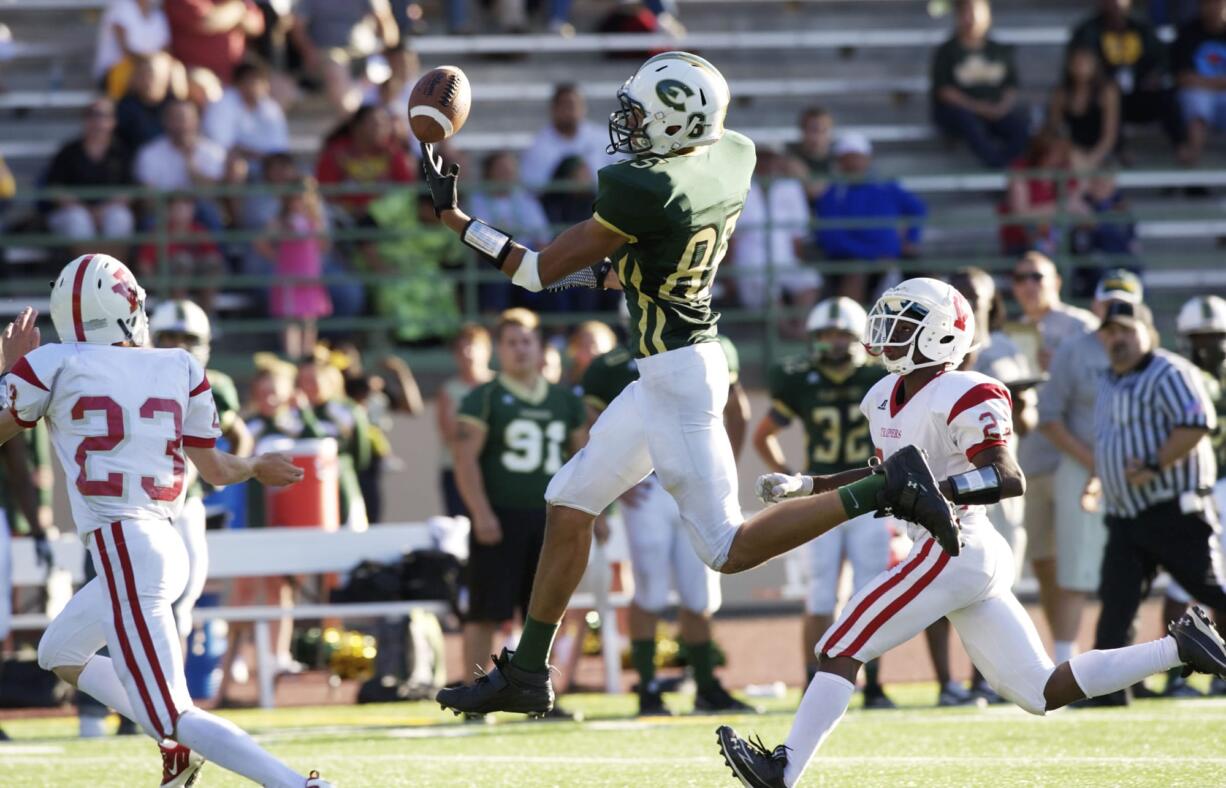 Evergreen faces Fort Vancouver in one of the Week 1 prep football games of 2013 (Steven Lane/The Columbian)