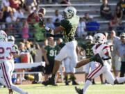 Evergreen faces Fort Vancouver in one of the Week 1 prep football games of 2013 (Steven Lane/The Columbian)