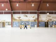 Only displays attached to the walls remained Wednesday at Pearson Air Museum after volunteers spent two days moving material out rather than risk handing private property over to the National Park Service.