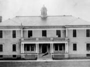 In the early 1900s, a megaphone was mounted in front of the steps at the Vancouver Barracks headquarters building entrance.