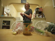 Audrey Williams, 22, gets ready to make African-style soup with the the groceries she could afford on a SNAP (food stamps) budget.