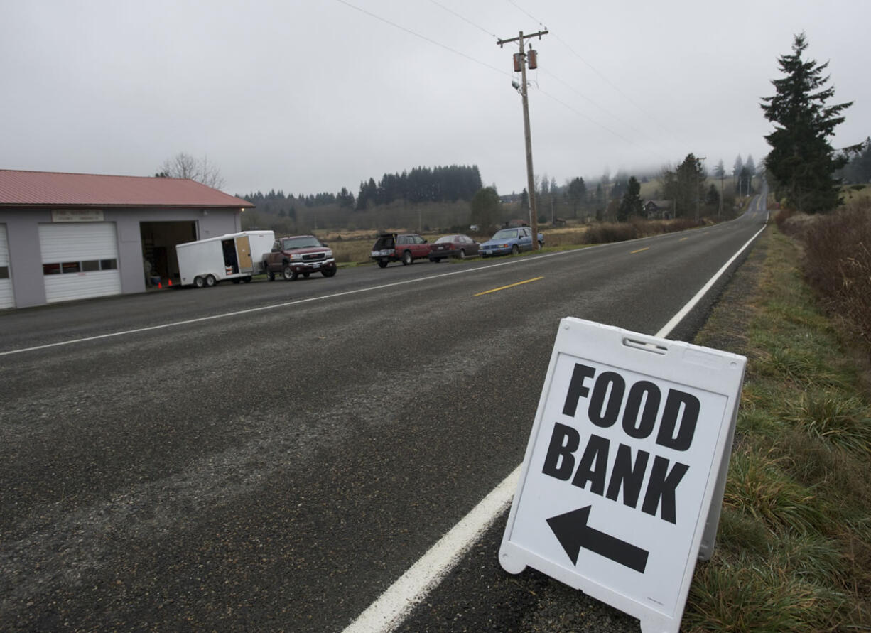 The Lewis River Food Bank's trailer backs up to the View Fire Station in La Center on Sunday.