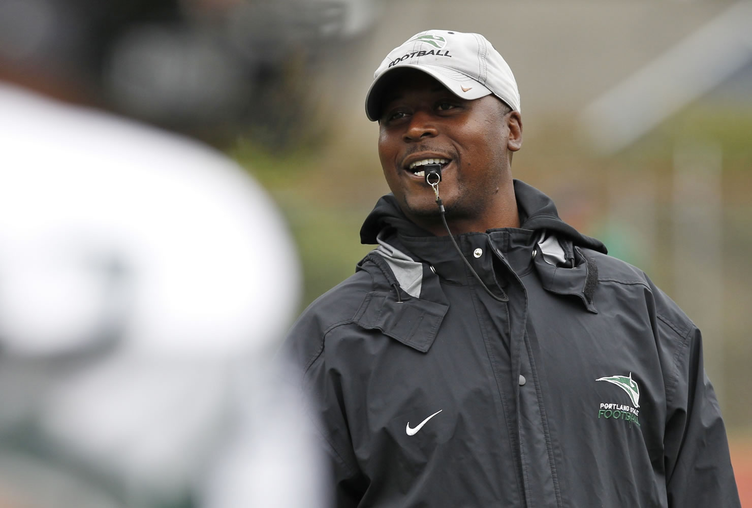 Portland State head football coach Nigel Burton watches scrimmage at McKenzie Stadium on Saturday.