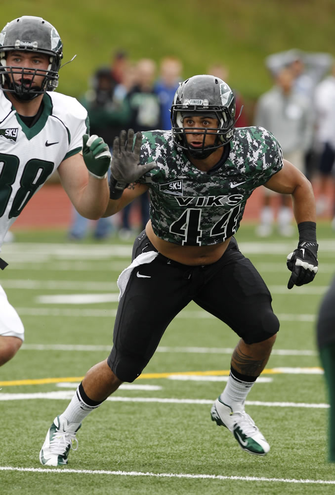 PSU linebacker Brandon Brody-Heim (44), a Union High grad, defends during scrimmage at McKenzie Stadium on Saturday.