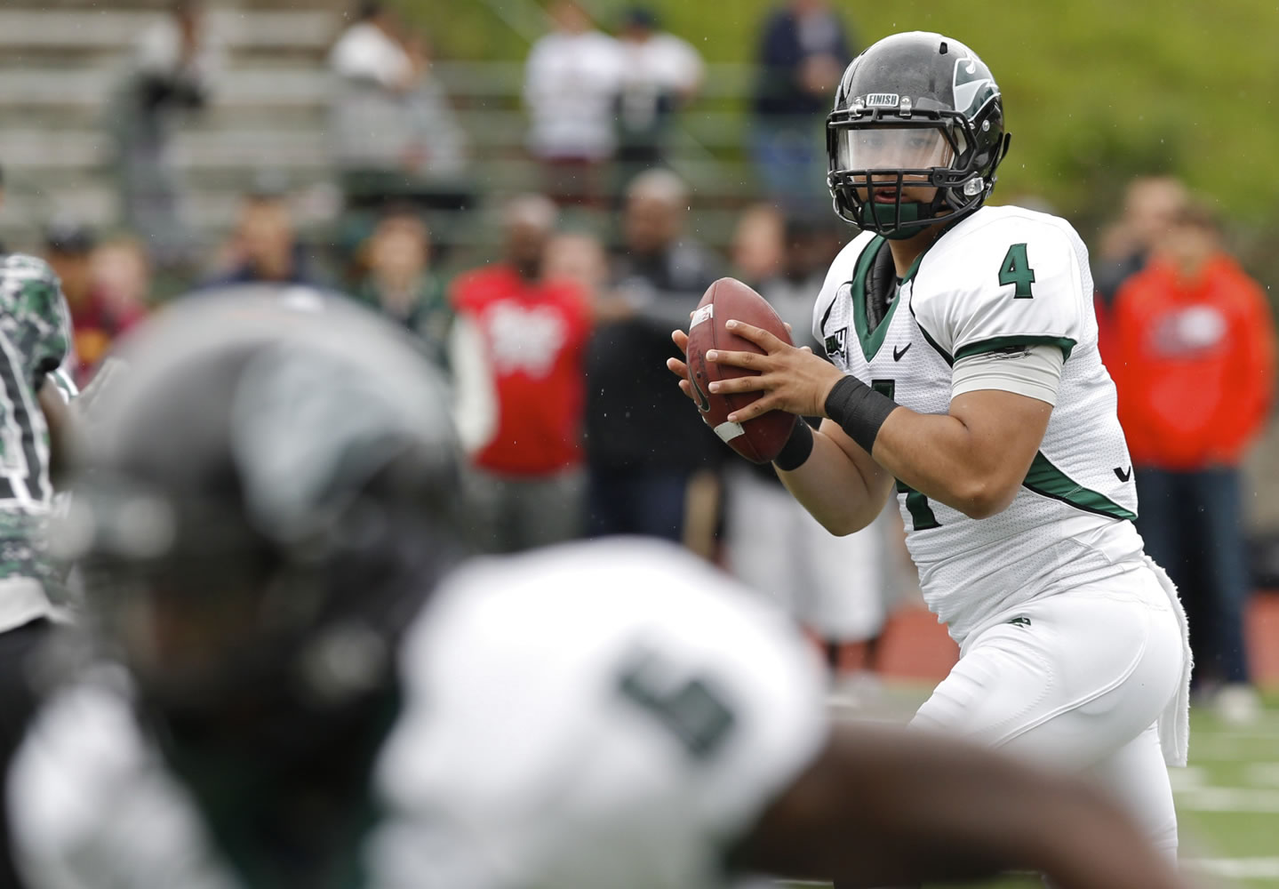 PSU quarterback Kieran McDonagh (4) passes during scrimmage at McKenzie Stadium on Saturday.