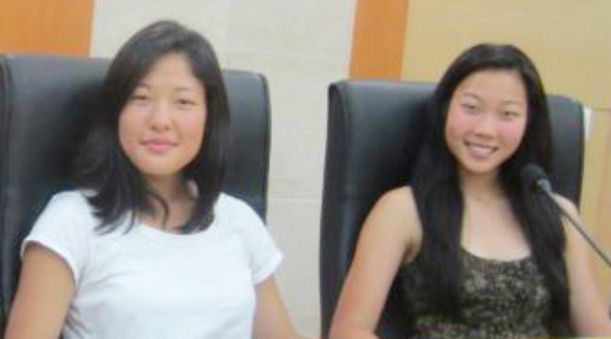 Hockinson: From left, sisters Nikki and Kelsey Dunham were invited to testify before a South Korean court on their views on adoption.