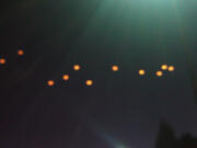 Sky lanterns are the likely culprit for the reports of mysterious lights over 500 and I-205 on Wednesday night.