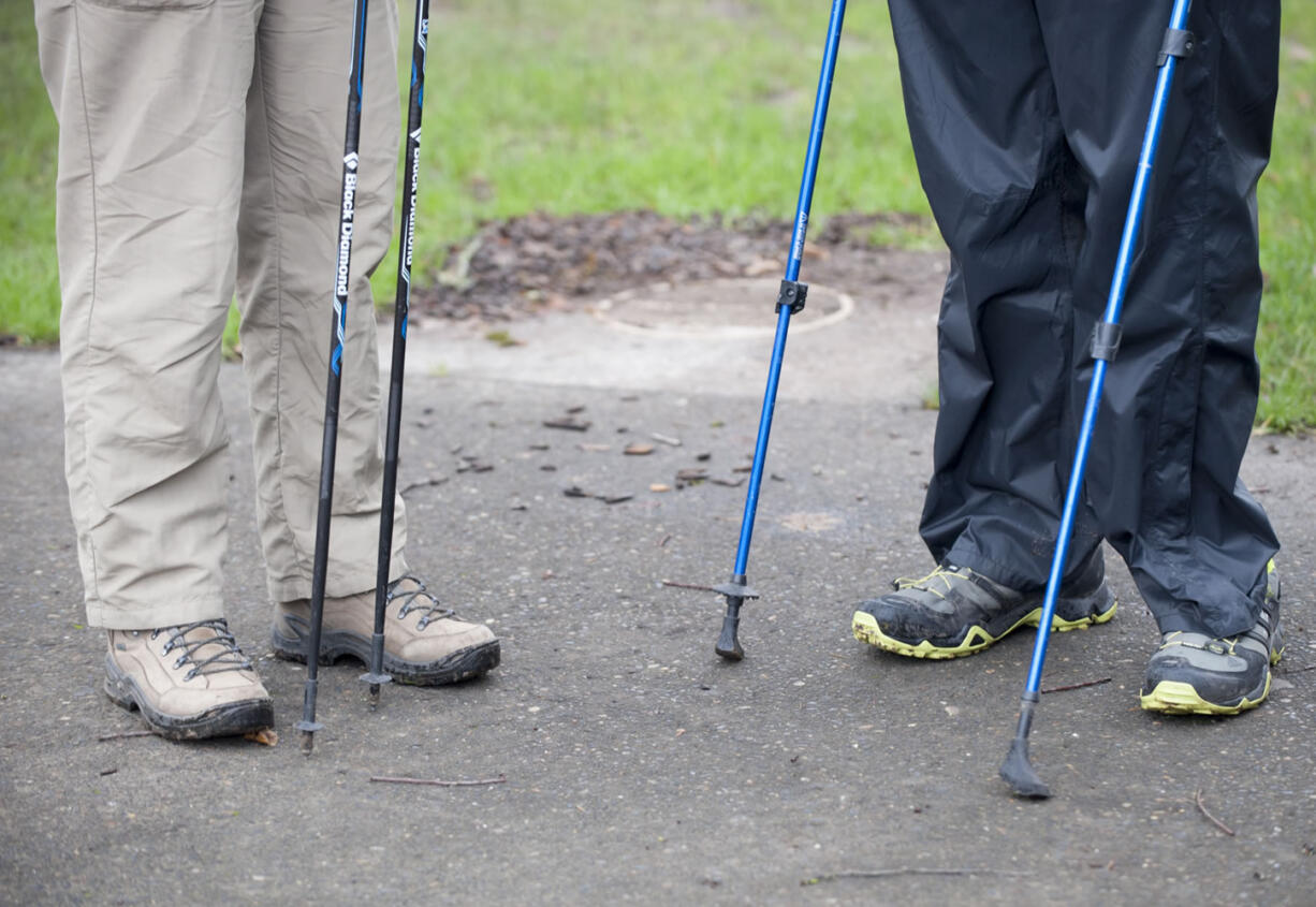 Some of these hikers get all high-tech. Hiking poles like these can make technical trails less tricky and take some of the burn out of hill climbs.