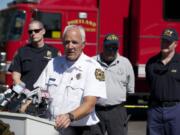 Fire Marshal John Harding addresses the media during a press conference about the investigation of the fire at the Thunderbird Hotel, Tuesday