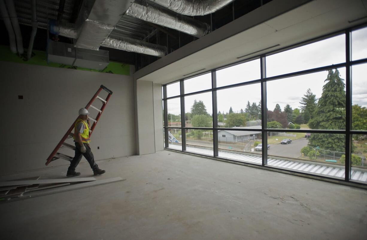 Construction is underway at the Evergreen Public Schools' Henrietta Lacks Health and Bioscience School, near PeaceHealth Southwest Medical Center.