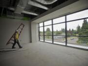 Construction is underway at the Evergreen Public Schools' Henrietta Lacks Health and Bioscience School, near PeaceHealth Southwest Medical Center.