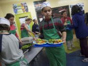 Eleven-year-old Kai Carterby just graduated from a 10-week healthy cooking class sponsored by the Clark County Food Bank.