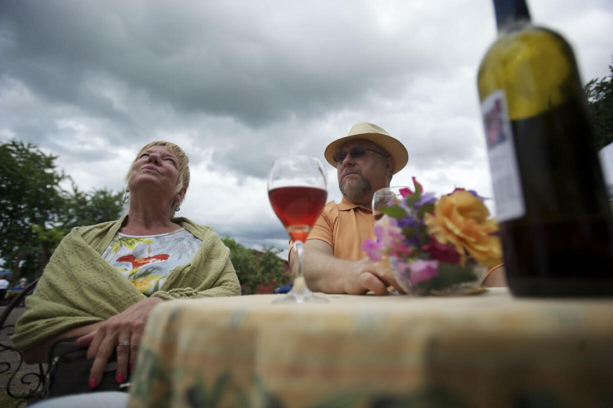 Kristina and Rick Lengvenis enjoy Friday Night Blush, a blend, at the English Estate Winery on Sunday.