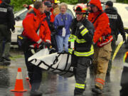 Members of the Vancouver fire and police departments and the Clark County Sheriff's Office take part in an armed shooter exercise Wednesday at Pearson Field in Vancouver.