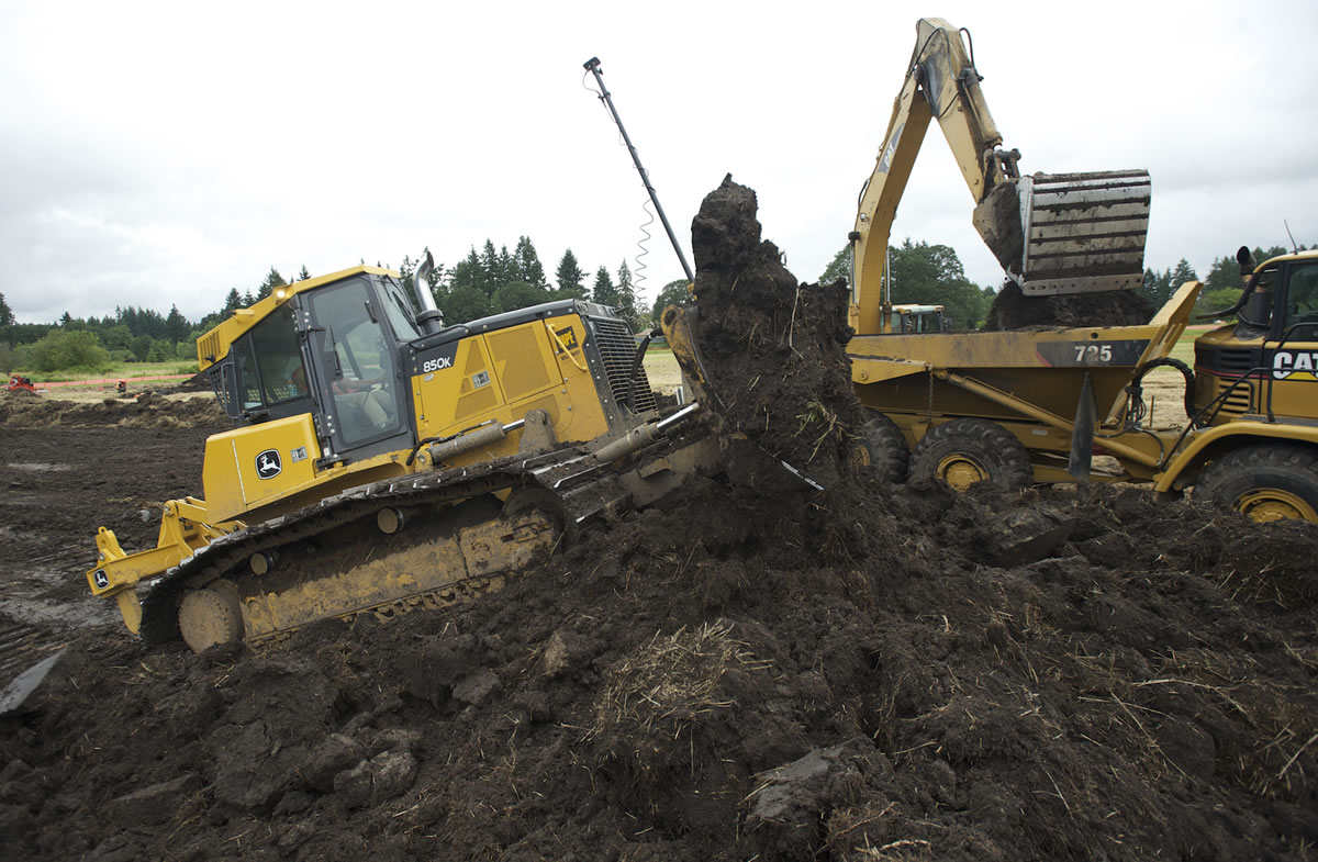 A wetland mitigation project connected to the widening of Highway 502 between I-5 and Battle Ground, is underway near N.E. 67th Avenue, Friday, July 20, 2012.