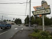 Businesses along Highway 502 near Dollars Corner, shown in 2011, are on the list of unresolved acquisitions includes the former site of O'Brady's Drive-In, which closed in 2012 amid a compensation dispute as WSDOT works to acquire at least part of the property.