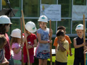 Orchards: Children hold ceremonial shovels at the Clark County Family YMCA in Orchards during its June 22 groundbreaking celebration.