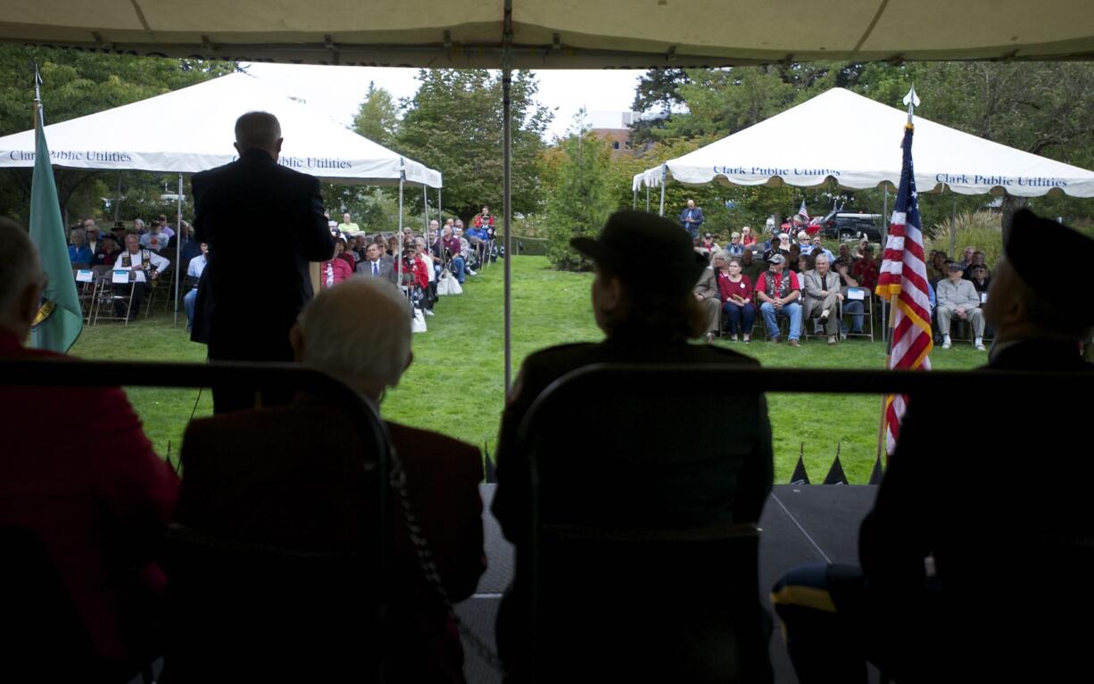 Larry Smith, Vancouver city council member, reminds people at Friday's POW/MIA Recognition Day event of the &quot;exceptional sacrifice&quot; of those service personnel and their families.