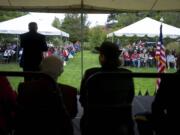 Larry Smith, Vancouver city council member, reminds people at Friday's POW/MIA Recognition Day event of the &quot;exceptional sacrifice&quot; of those service personnel and their families.