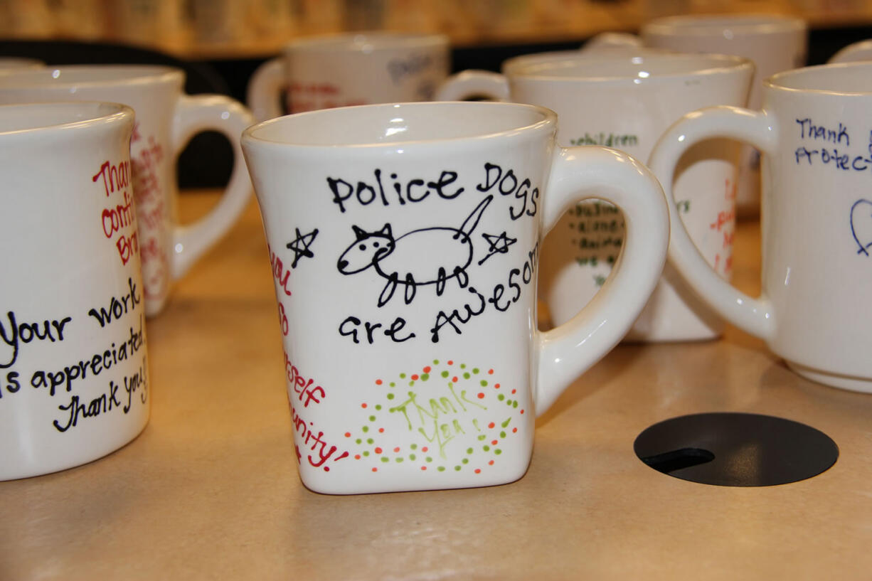 Danielle Ireland and her daughter, Addi Dearinger, who own Earth, Glaze &amp; Fire in Vancouver, reproduced drawings and messages of support collected from community members to create 190 customized coffee mugs for Vancouver police officers.