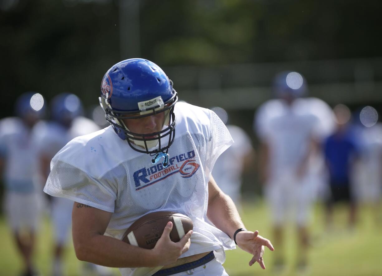 Senior John White says coach Dan Andersen's background at Ridgefield will help as he takes over as head coach.