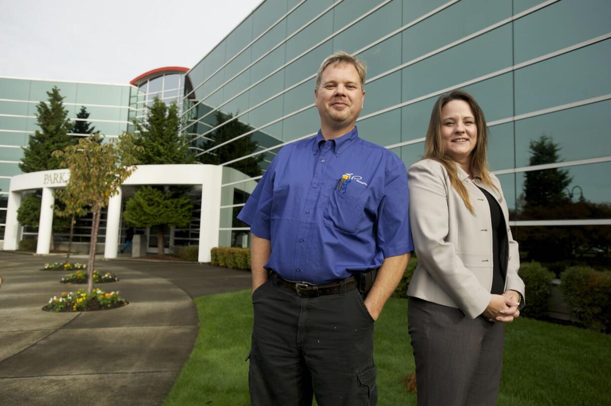 Park Plaza asset manager Monique Still, right, and building maintenance manager Scott Vale, worked together to earn a $135,760 rebate for a $193,000 project to upgrade the business park's heating, ventilation and air conditioning.