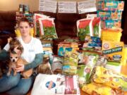 Walnut Grove: Volunteer Tanika Campbell helped collect hundreds of pounds of dog and cat food, litter and treats for Furry Friends and Second Chance Companions.