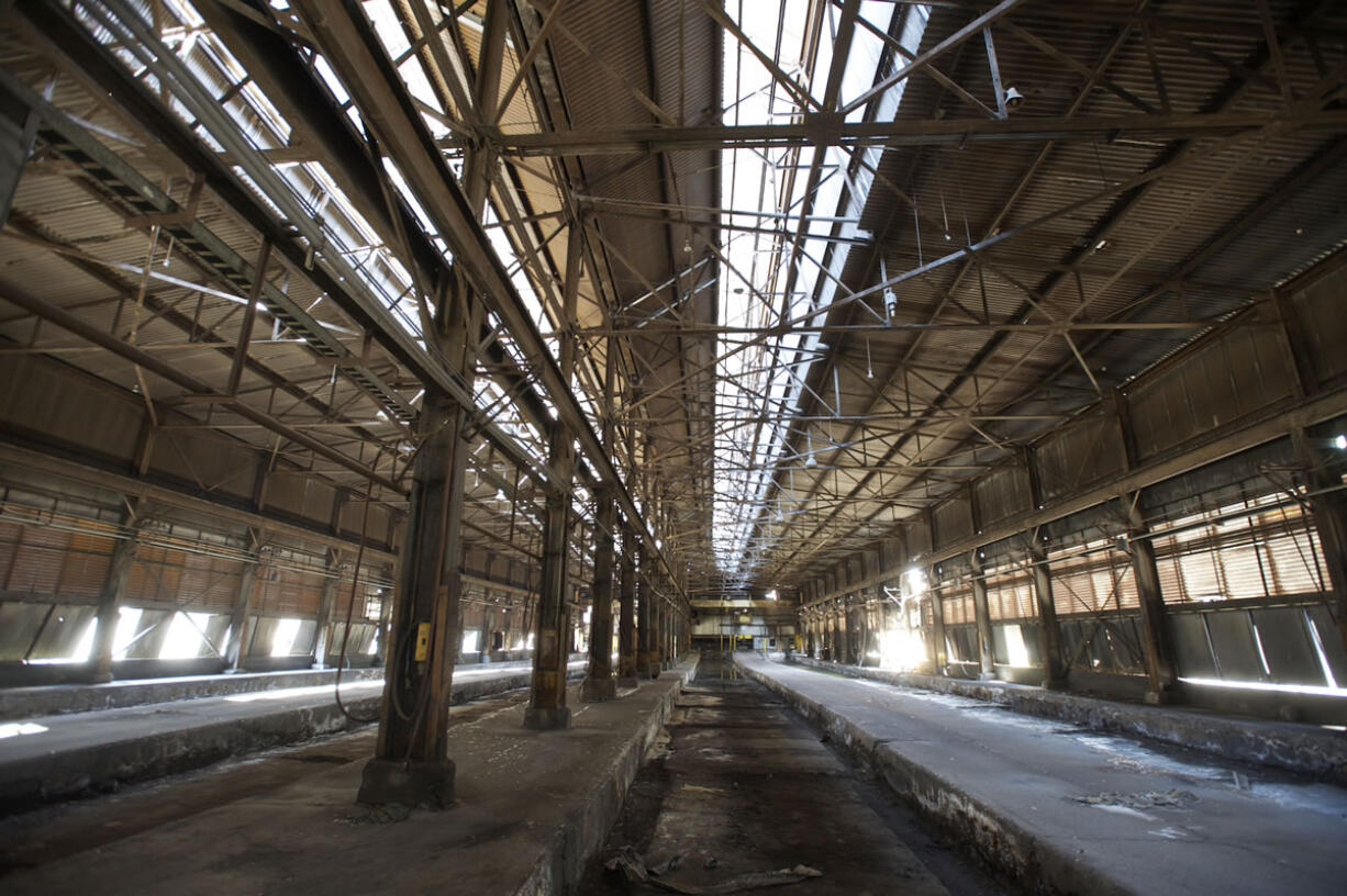 Massive structures, like the one pictured above, are remnants of what the site now operated by Millennium Bulk Terminals-Longview used to be: an aluminum smelting operation stretching back to 1941.