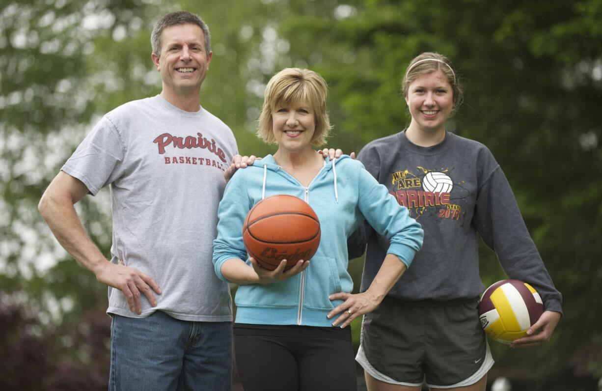 Jani Sitton, center, grew up with limited opportunities as a female athlete.