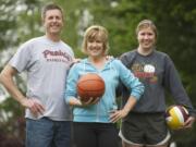 Jani Sitton, center, grew up with limited opportunities as a female athlete.