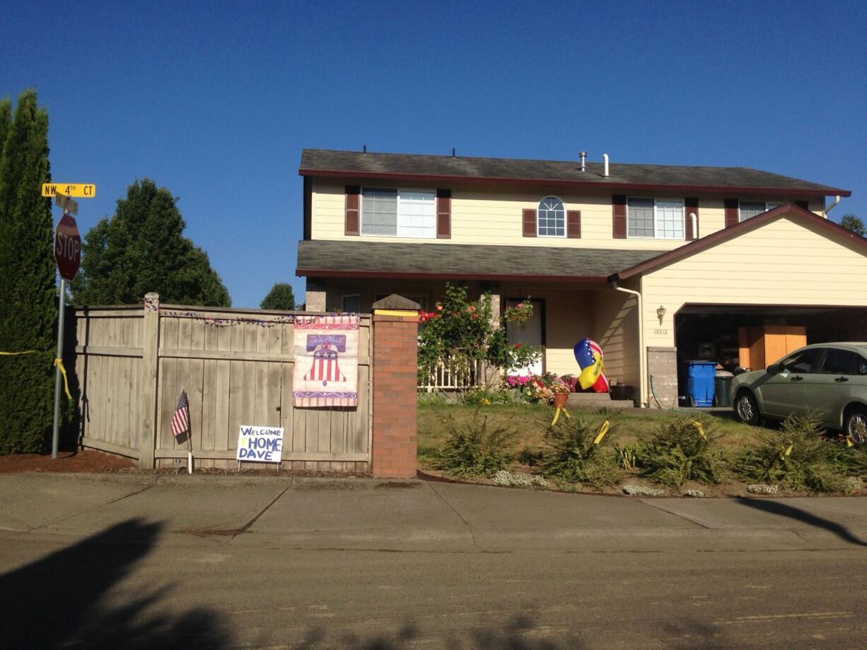 North Salmon Creek: Elizabeth Kullberg gathered neighbors to adorn their community with welcoming decorations last week for returning Army soldier Dave Jensen, who was deployed to Afghanistan a year ago.