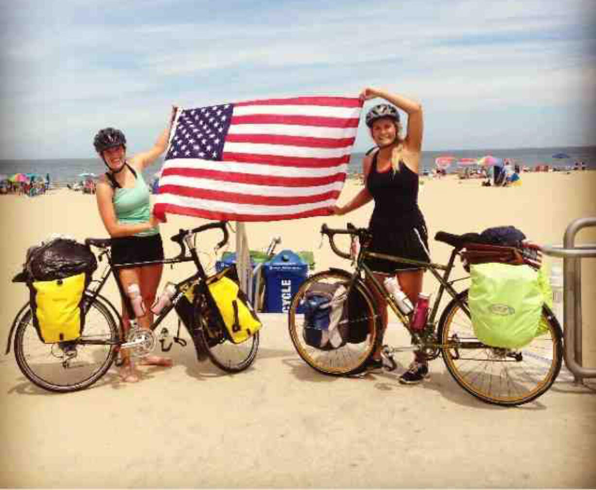 West Hazel Dell: Columbia River High School graduates Carolyn Murray and Joani Dahmen stop for a moment on their cross-country bicycle trip from California to Virginia.