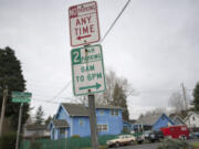 Signs indicating that two-hour parking is available are posted in Vancouver&#039;s Hough neighborhood. Residents say they are having issues with parking because nonresidents park in the neighborhood.